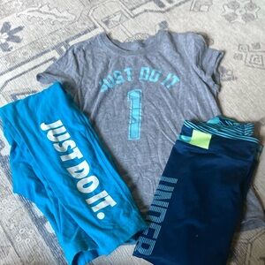 Girls size large clothing bundle Nike tshirt Nike pants and underarmour capris